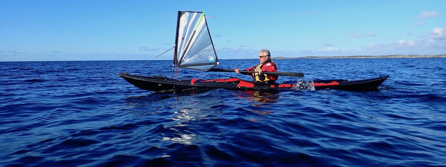 Paddlesailing hos Escape Outdoors